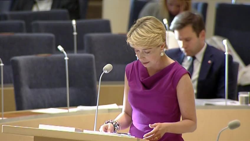 Stillbild från Interpellationsdebatt, Tillämpning av reglerna för bostadsbidrag försvårar för kommunerna 