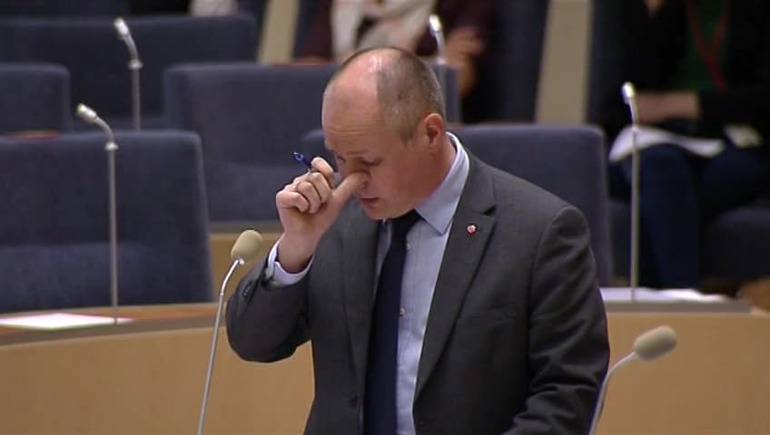 Stillbild från Interpellationsdebatt, Långa handläggningstider av arbetstillstånd